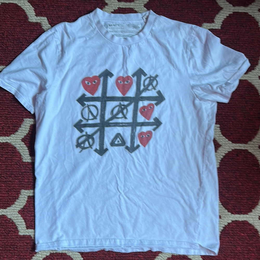 White Graphic Tee with Red and Black Design